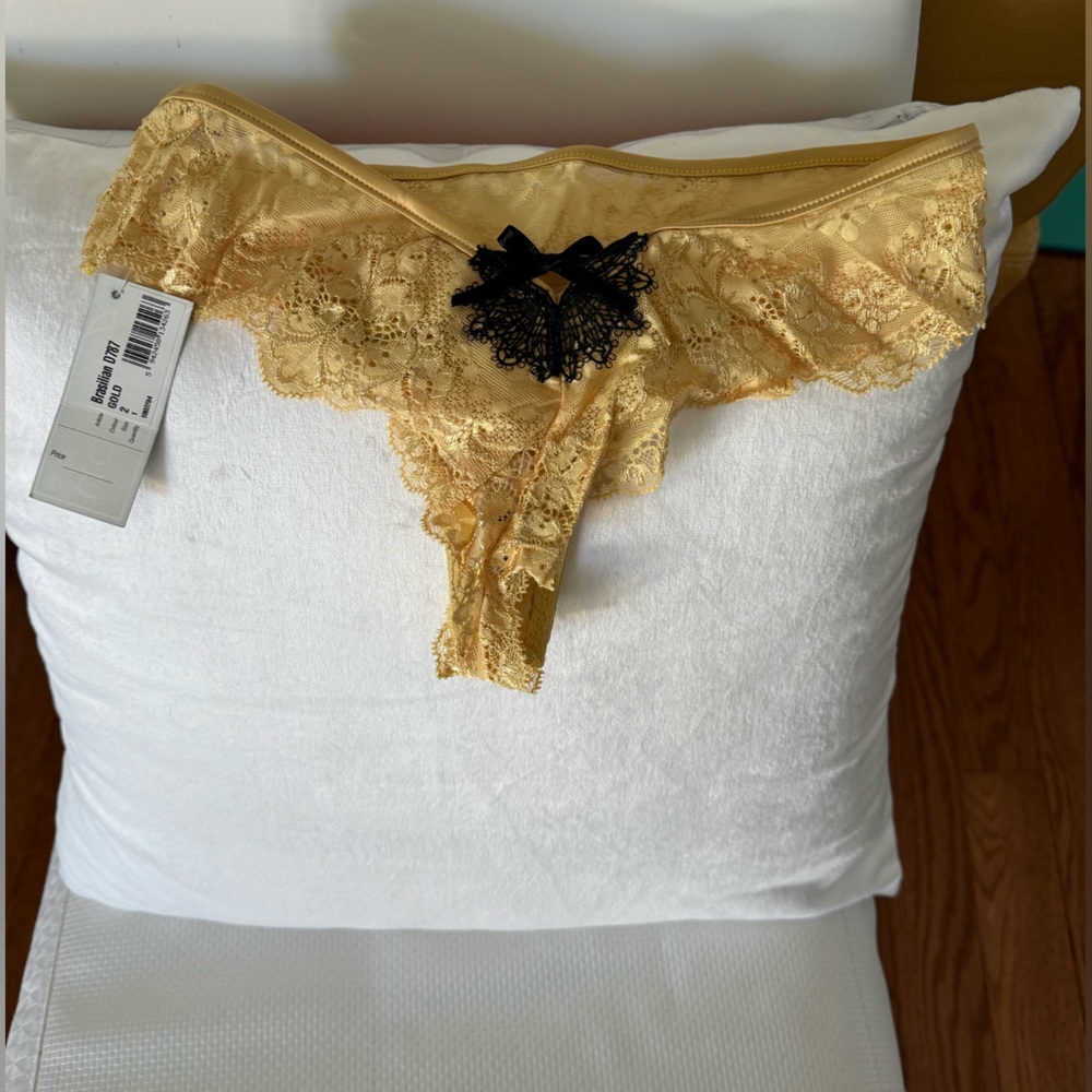 Women’s beautiful thing style underwear. Never worn. Size 2. New with tags.